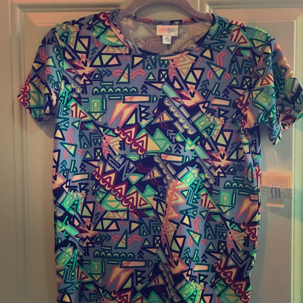 Girls  size 10/12.  Shirts and shorts